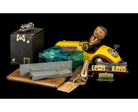 A Small Mixed Lot to include a Japanese clockwork tin plate motor car, registration 1A3150, no visible makers mark, an Italia