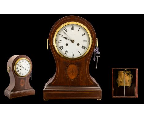 English 19th Century Impressive and Tall Mahogany and Inlaid Cased Mantel Clock of Waisted Form. With 8 day striking movement