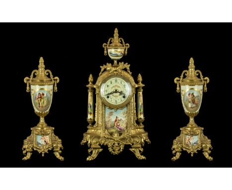 A 1980's German Brass Garniture Clock Set in the Louis XIV style with painted panels. Of typical form with urn pediment above