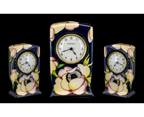 Moorcroft Modern Tube lined Table Clock Paradise Flower Pattern.  Designer Emma Bossons.  Date 2003.  6'' - 15 cm high.  .