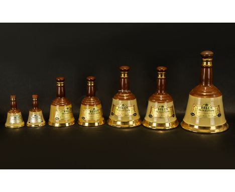 Drinkers Interest - Collection of Bell's Whiskey Wade Ceramic Bells some with contents.  Comprises one large 75cl bell, two 3