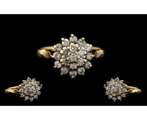 9ct Gold Diamond Set Cluster Ring.  Flowerhead setting, fully hallmarked for 9.375.  The diamond of good sparkle.  Estimated 