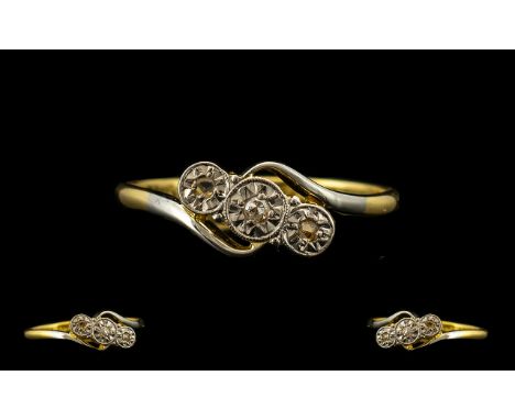 18ct Gold Diamond Ring set with three diamond chips on a twist. Fully hallmarked, Ring size N.5.