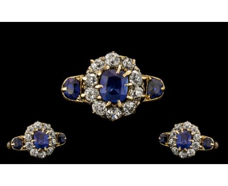 18ct Gold Attractive Sapphire &amp; Diamond Cluster Ring Flower head design.  Marked 18ct.  The sapphires and diamonds of exc