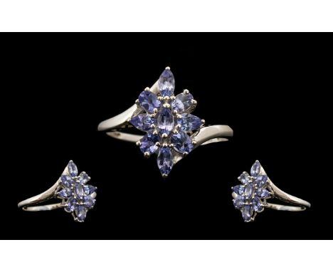 Tanzanite Lozenge Shape Cluster Ring, marquise and pear cut tanzanites of 2cts in a cluster, with the platinum vermeil and si