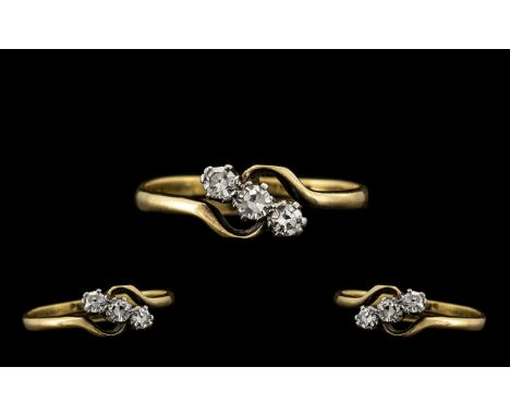 18ct Gold and Platinum 3 Stone Diamond Ring, The 3 Old Cut Diamonds of Good Clarity / Colour. Est Diamond Weight. 0.20 pts. M