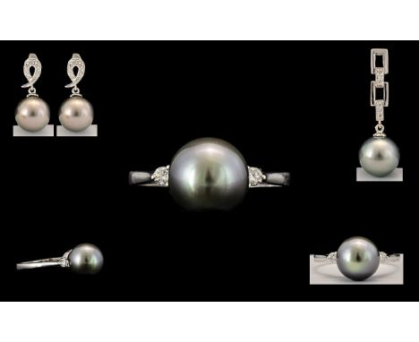 9ct Tahitian Pearl &amp; SI Diamond Ring - Round Tahitian Pearl 9 mm, weight 4.300 cts, Diamond weight 0.087 cts. Ring size (