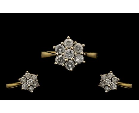 18ct Gold Attractive Diamond Set Cluster Ring Flowerhead setting.  Full hallmark for 18ct.  The diamonds of good sparkle.  Es