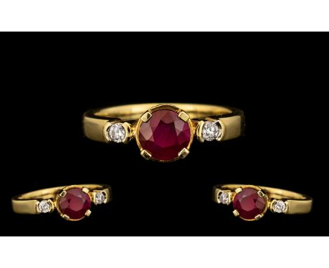 18ct Gold Top Quality Burmese Ruby and Diamond Set Ring marked 18kt.  The Burmese natural Ruby of excellent rich colour.  Rub