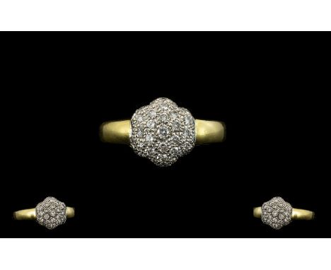 18ct Gold Diamond Set Cluster Ring - Flowerhead Design of Solid Construction. Full Hallmark for 18ct. The Diamonds of Good Sp