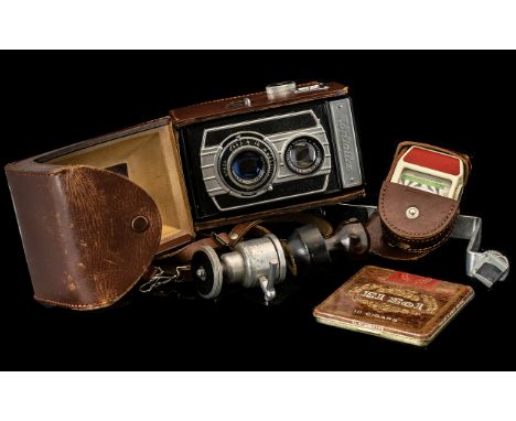 Vintage Weltaflex Camera in leather case, with bakelite light meter and other accessories, all housed in a tan carrying bag. 