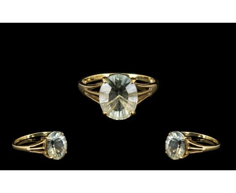 9 ct Yellow Gold and Oval Green Amethyst Single Stone Ring - Oval cut Amethyst weight 2.706 cts. 11 mm x 9 mm. Ring size (N) 