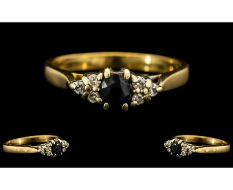 Ladies 9ct Gold Attractive Sapphire and Diamond Set Dress Ring - fully hallmarked for 9ct. Pleasing design, ring size R. All 