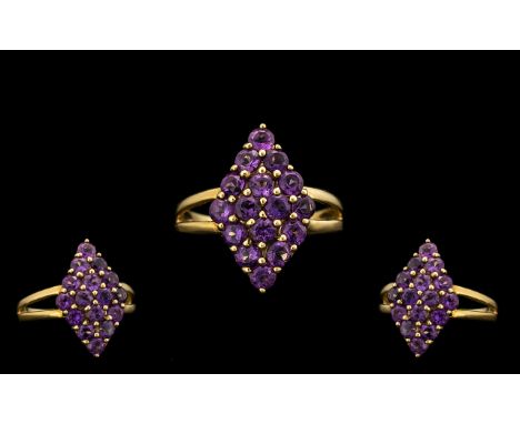 Ladies 9ct Gold Attractive Amethyst Set Dress Ring of Pleasing Form. Marked with Full Hallmark for 9.375, Amethysts of Good C