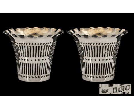 Edwardian Period Nice Quality Pair of Open Worked Silver Flared Rim Vases of nice proportions.  Hallmark London 1903.  Maker 