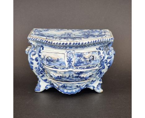 A rare Dutch Delft miniature commode, mark of Antonius Pennis, De Twee Scheepjes Pottery, 10cm high x 15.5cm wide.&nbsp; 