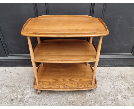 A mid-century Ercol elm and beech 458 trolley,&nbsp;with blue sticker, 71cm wide. 