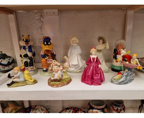 Two Kevin Francis 'Looney Tunes' character jugs;&nbsp;together with five Royal Doulton figures; a Royal Worcester figure; and