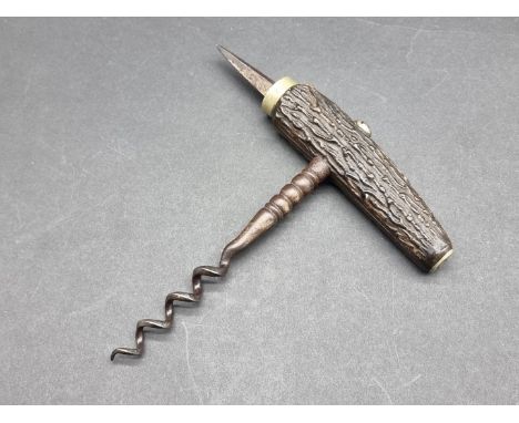 An early 1900 stag antler direct pull corkscrew with spike.&nbsp; 