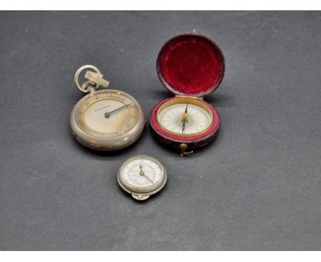 A vintage nickel plated pedometer, with scale in miles, 4.5cm diameter; together with a small 'Morris's Patent' map measurer;