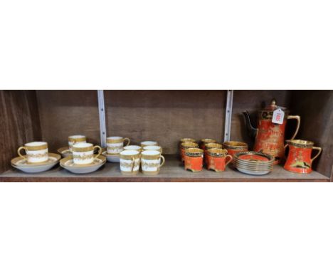 A Carlton Ware 'Rouge Royale' coffee service,&nbsp;(s.d. to two coffee cans); together with a set of nine Limoges coffee cans