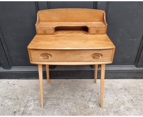 A mid-century Ercol elm and beech 439/479 writing desk,&nbsp;with blue sticker, 68.5cm wide. 