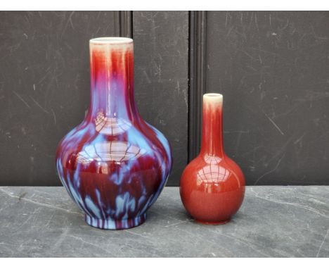 A Chinese flambe baluster vase,&nbsp;Yongzheng six character seal mark to base, 27cm high; together with another sang de boeu
