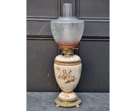 A good Victorian Royal Worcester blush ivory oil lamp,&nbsp;circa 1891,&nbsp;with pierced brass mounts, height excluding chim