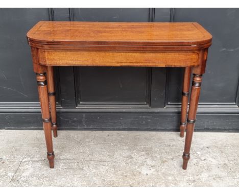 A George IV mahogany, line inlaid and crossbanded card table,&nbsp;with double gateleg, 91cm wide. 