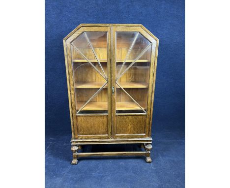 An Art Deco oak display cabinet. H.155 W.87 D.30.cm 