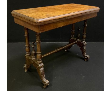 A Victorian walnut and burr walnut card table, rounded rectangular top, turned supports, ceramic casters, 70cm high, 88cm  wi