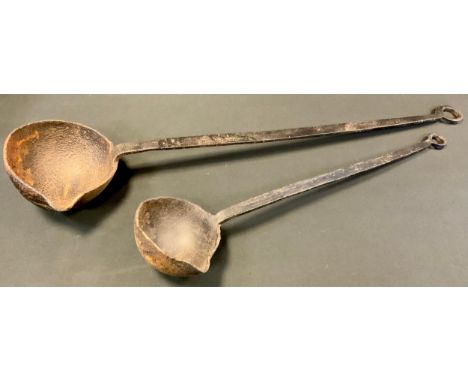 A 19th century cast iron blacksmiths/plummers metal/lead smelting ladle, single spout bowl, tapering handle, looped terminal,
