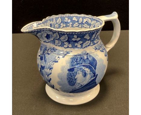 An early 19th century blue and white transferware jug, for the 1820 Royal Divorce proceedings, printed with portrait of Queen