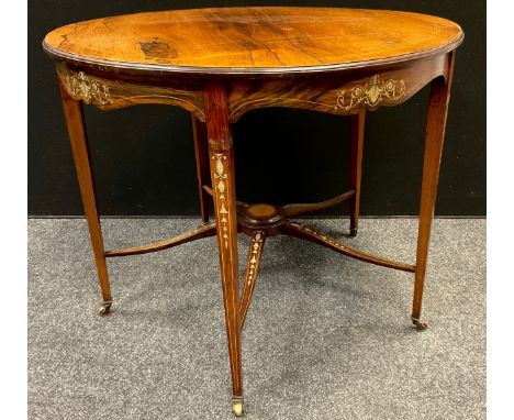 A late Victorian rosewood circular table, inlaid with shells and scrolls, tapered legs, shaped X stretcher with central round