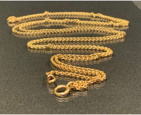A late 19th century gold muff chain, eagle head marks, 160cm long, 44.2g gross 