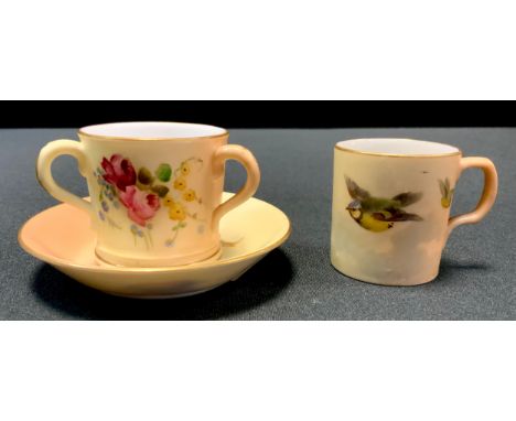 A Royal Worcester miniature coffee cup and saucer, decorated  with British birds in flight on a blush ivory ground, gilt line