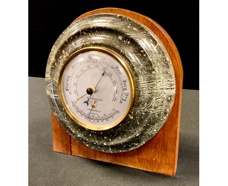 A 20th century serpentine Cornish Lizardite aneroid barometer, 17cm diam, mounted 