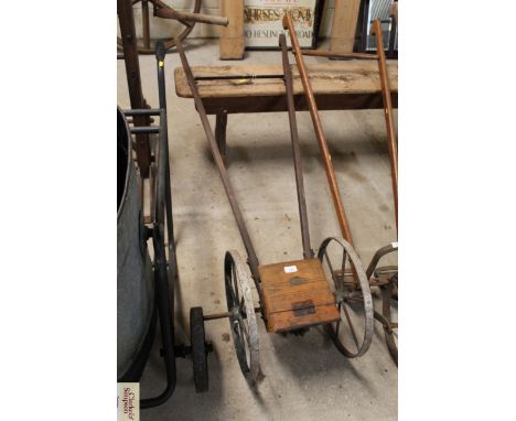 A vintage seed drill made by Horace Fuller Ltd. of Horsham