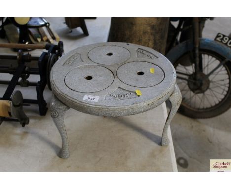 A Con enamel tripod stand to fit a primus stove.