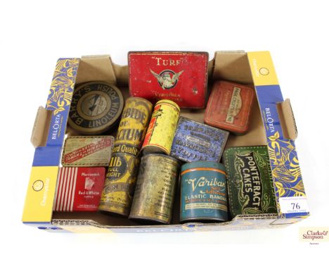 A box of various vintage tins