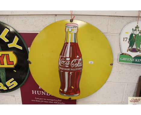 A circular enamel Coca Cola sign, 30" dia.
