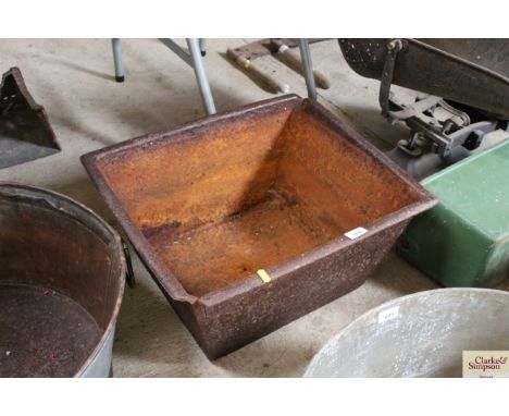 A cast iron trough, approx. 21" x 17½"