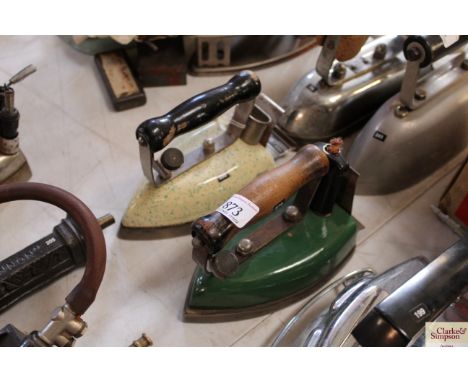 A Westmoreland electric green enamel iron and a yellow green speckle enamel Lincass electric iron