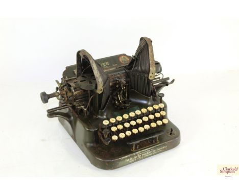 A vintage "The Oliver Typewriter", by The Oliver Typewriter Company Chicago USA