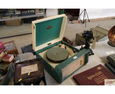 A green and cream Dansette record player