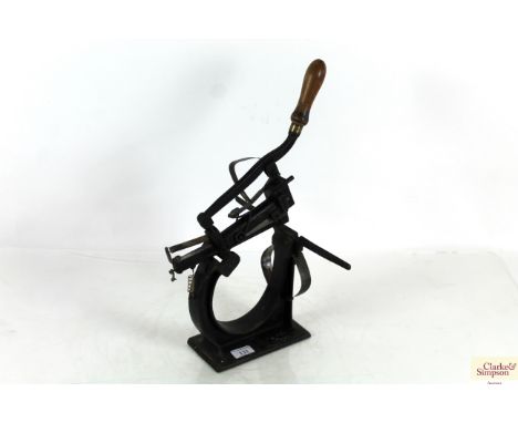 A vintage punch/stapler machine
