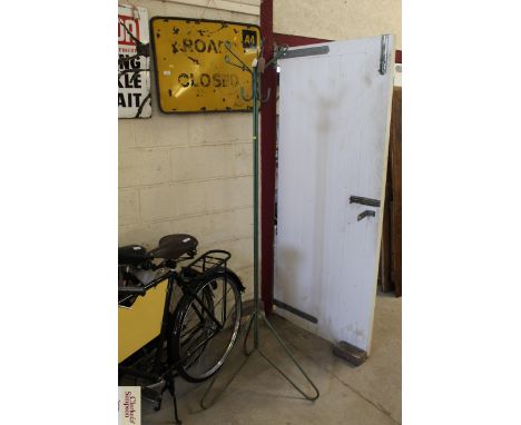 A vintage tubular metal hat and coat stand