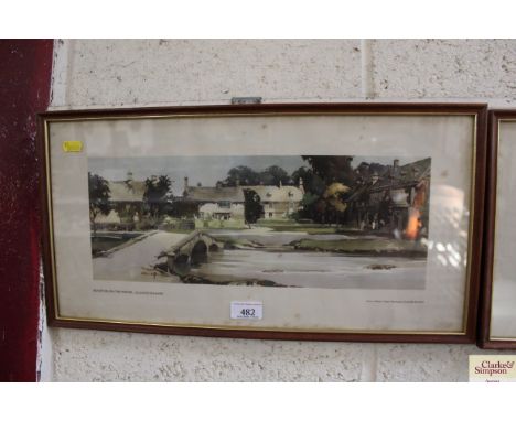 A 1950's Western Region Railway Carriage print of Bourton on the Water, after a watercolour by Claude Buckle, framed and glaz