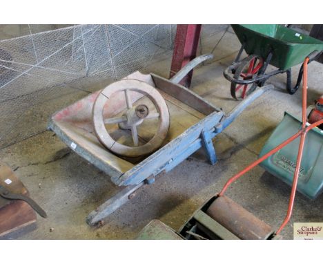 A vintage wooden wheelbarrow  AF