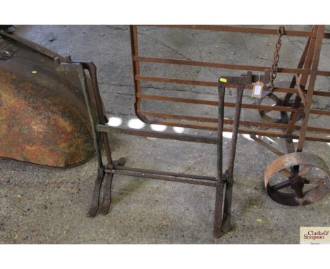 A pair of vintage iron trestle stands